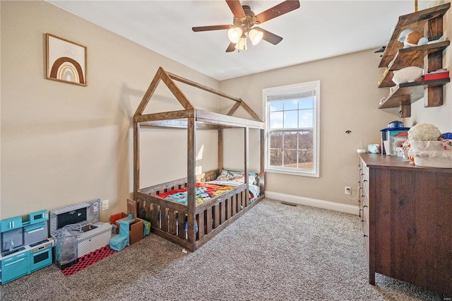 carpeted bedroom with ceiling fan