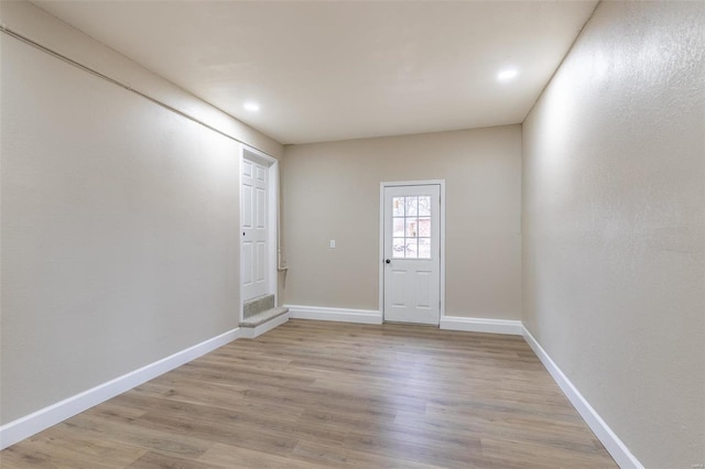 empty room featuring light hardwood / wood-style floors