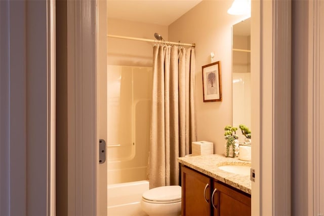 full bathroom featuring shower / bathtub combination with curtain, vanity, and toilet