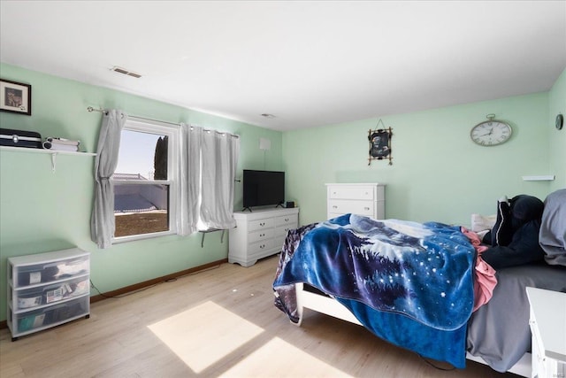 bedroom featuring light hardwood / wood-style flooring