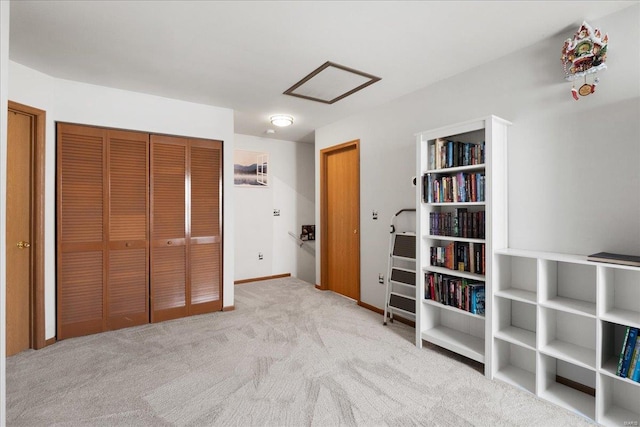 carpeted bedroom featuring a closet