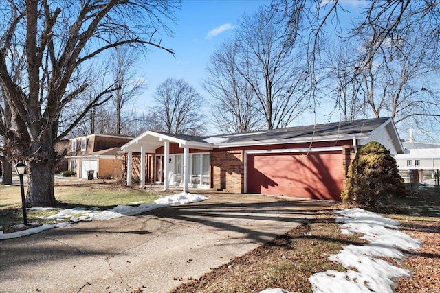 view of front of house featuring a garage and covered porch