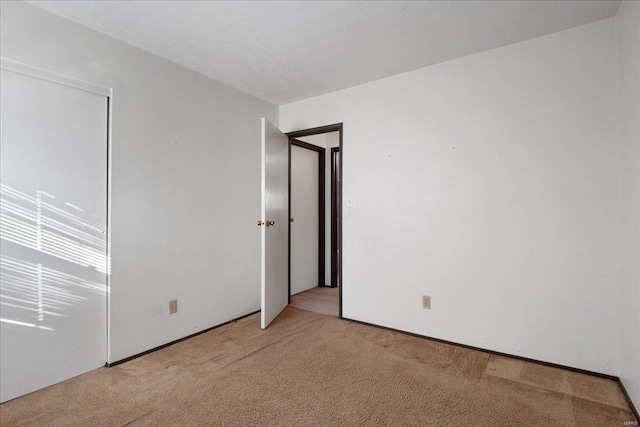 empty room with light carpet