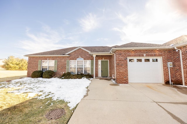 single story home featuring a garage