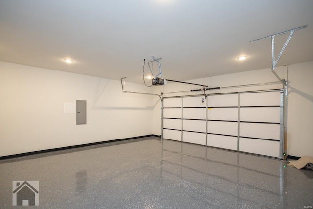 garage with electric panel, baseboards, and a garage door opener