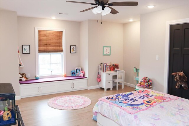 bedroom featuring recessed lighting, visible vents, light wood-style floors, a ceiling fan, and baseboards