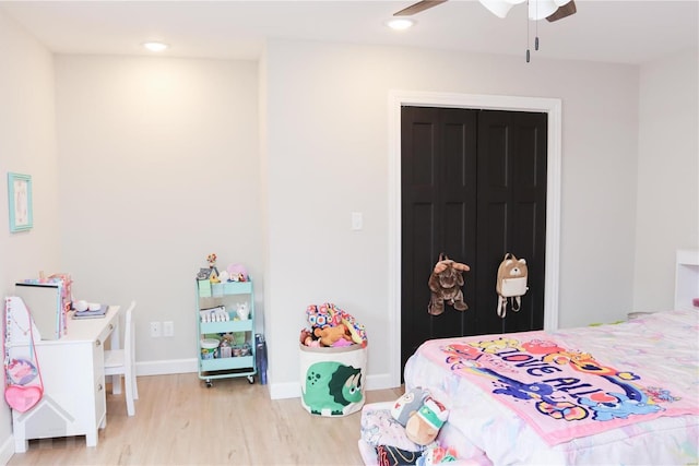 bedroom featuring recessed lighting, ceiling fan, baseboards, and wood finished floors