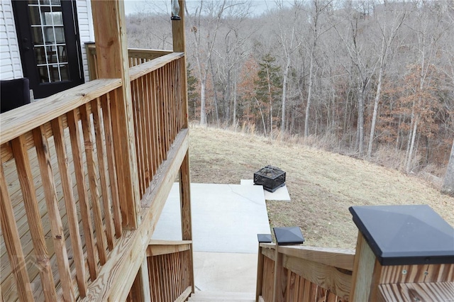 exterior space featuring a view of trees