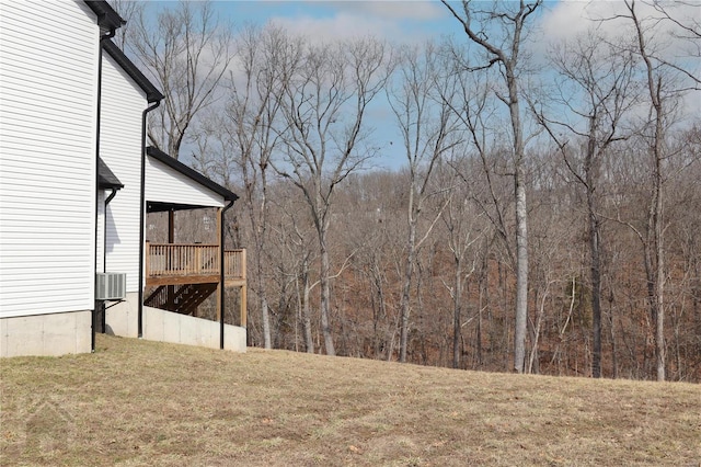 view of yard with a wooded view