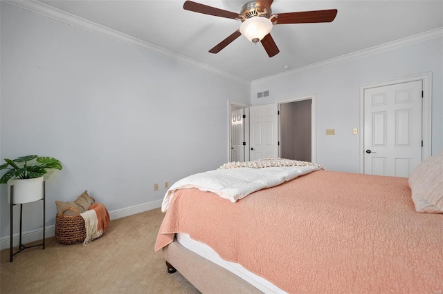 bedroom featuring crown molding, light carpet, and ceiling fan