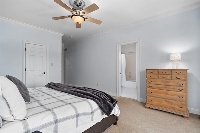 bedroom with ceiling fan, ornamental molding, connected bathroom, and light carpet