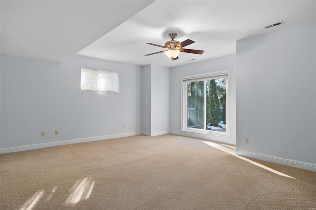 carpeted empty room with ceiling fan