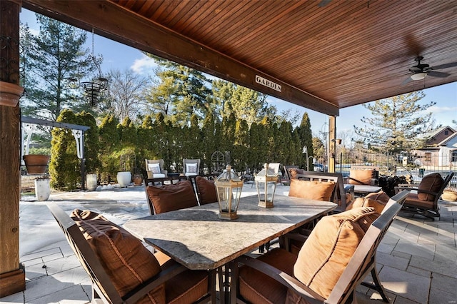 view of patio / terrace featuring ceiling fan