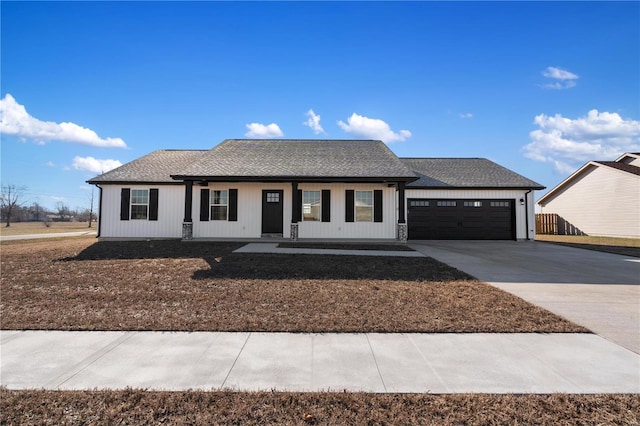 view of front of home featuring a garage and covered porch