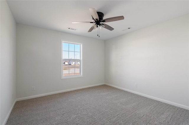 unfurnished room featuring carpet floors and ceiling fan