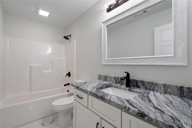 full bathroom with vanity, washtub / shower combination, and toilet