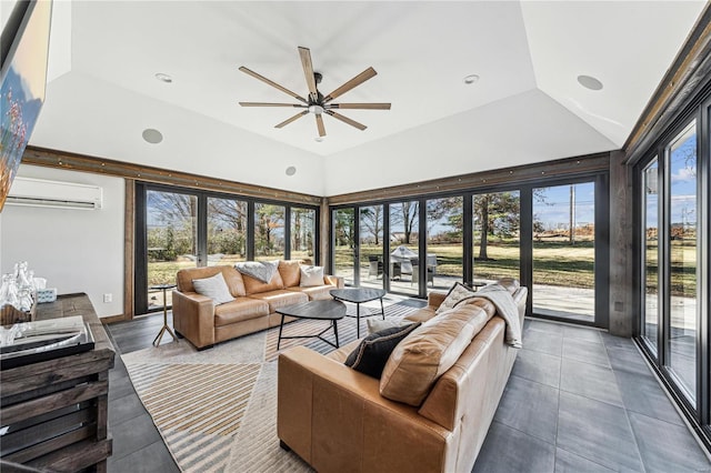 sunroom featuring vaulted ceiling, a ceiling fan, and a wall mounted AC