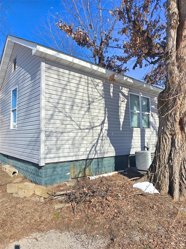 view of property exterior featuring central AC unit