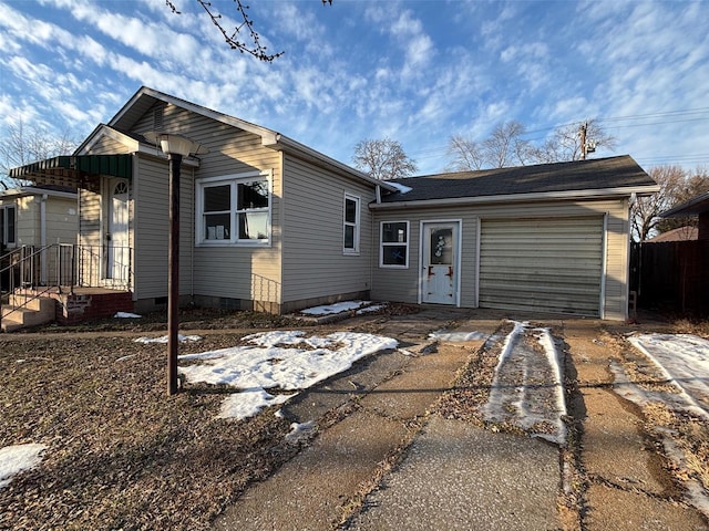 view of front of property featuring a garage