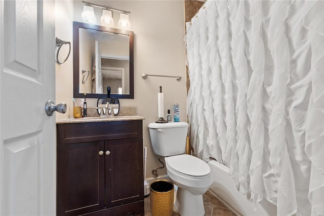 full bath featuring toilet, tile patterned flooring, shower / bath combination with curtain, and vanity