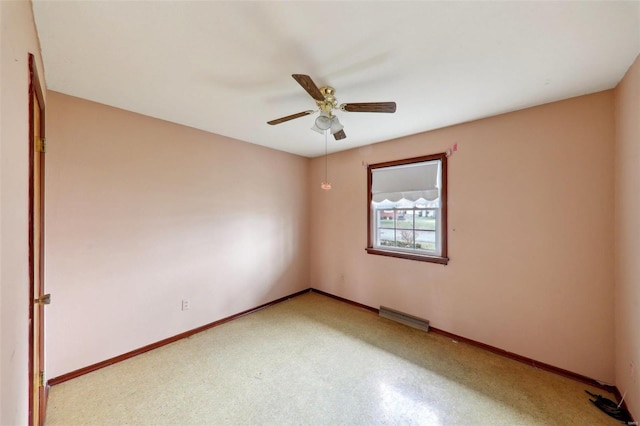 unfurnished room with ceiling fan