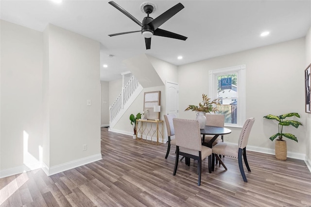 dining room featuring hardwood / wood-style floors and ceiling fan