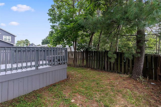 view of yard with a deck