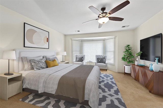 carpeted bedroom featuring ceiling fan