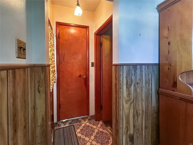 hallway with wooden walls