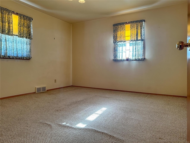 view of carpeted spare room