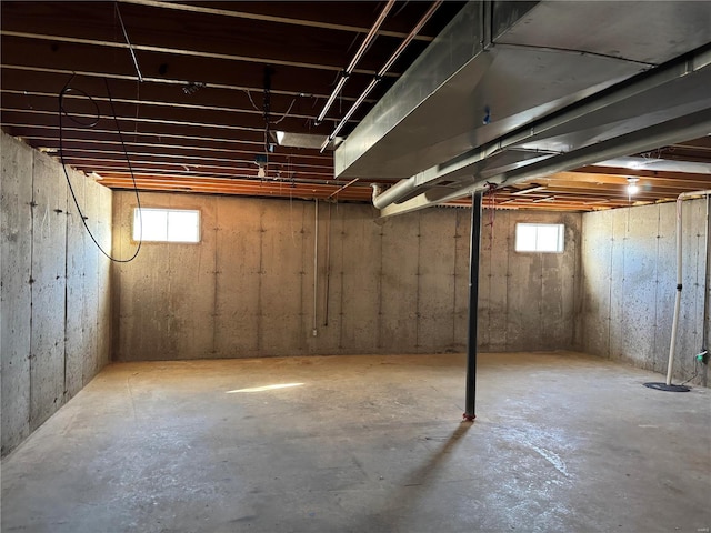 basement featuring plenty of natural light