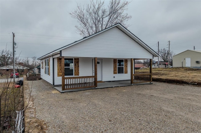 bungalow featuring covered porch