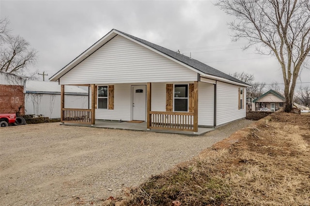 bungalow-style house featuring covered porch