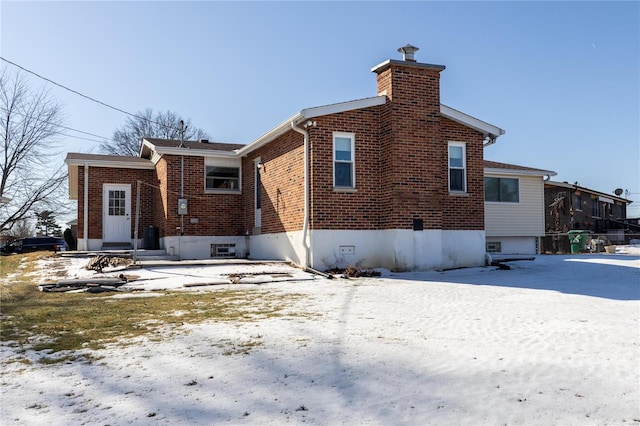 view of snow covered property