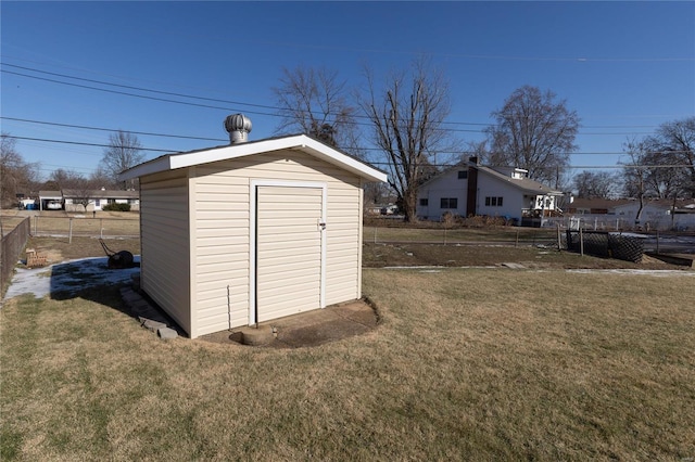 view of outdoor structure featuring a yard