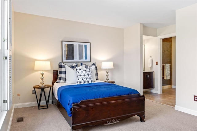 bedroom featuring carpet flooring, visible vents, and baseboards