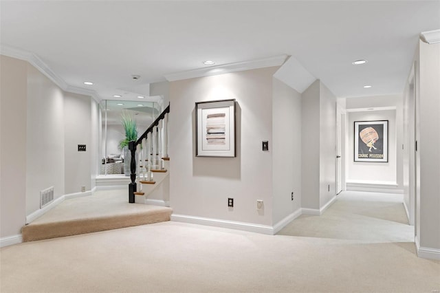 corridor with light carpet, visible vents, crown molding, and recessed lighting