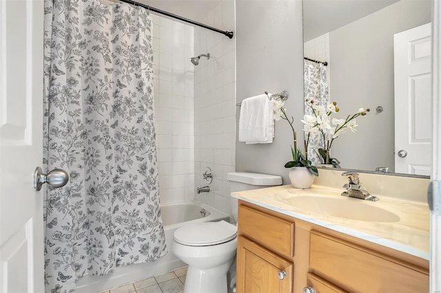 bathroom with shower / bath combination with curtain, tile patterned flooring, vanity, and toilet