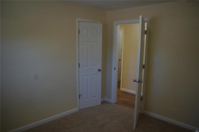 unfurnished bedroom featuring carpet floors