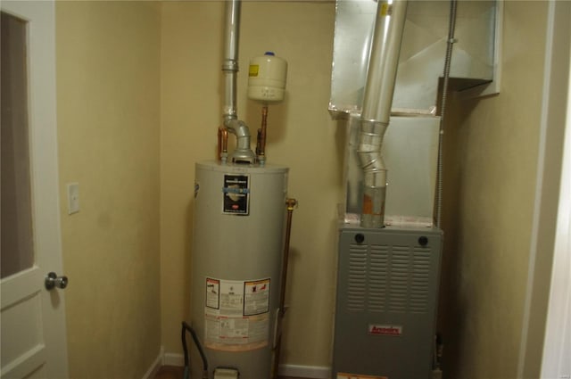 utility room featuring gas water heater