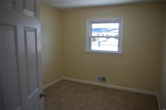 view of carpeted spare room