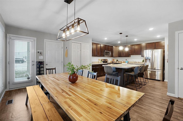 dining area featuring light hardwood / wood-style floors