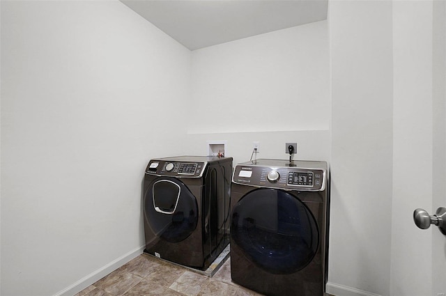 laundry area with washer and clothes dryer