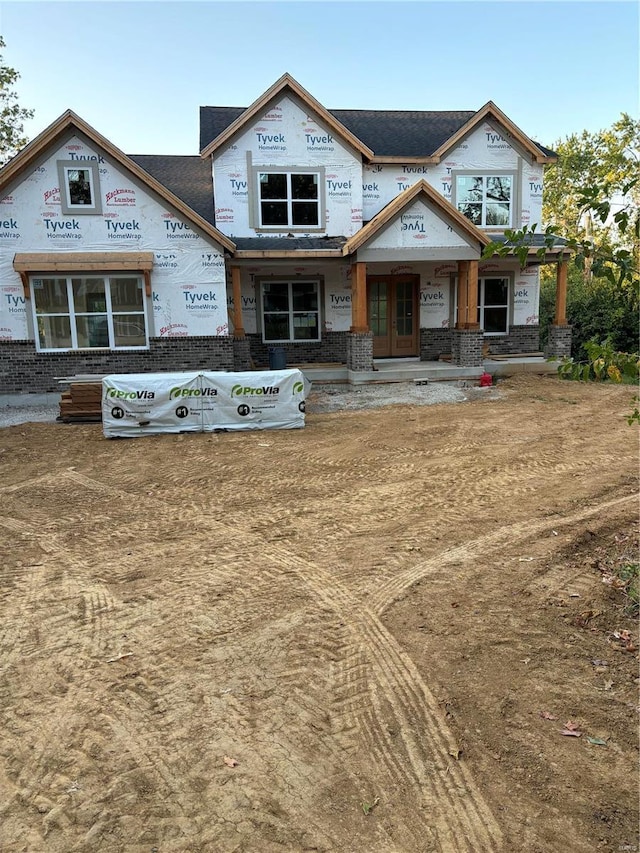 unfinished property with french doors