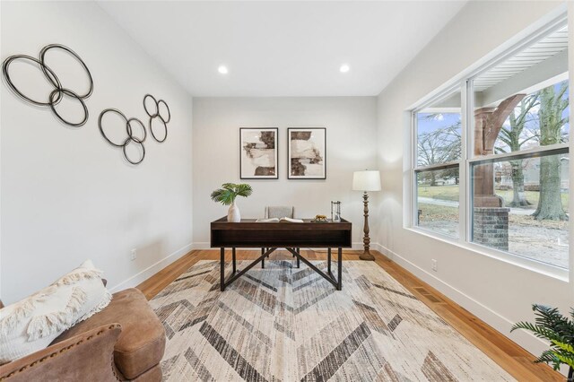 home office with baseboards, recessed lighting, and light wood-style floors
