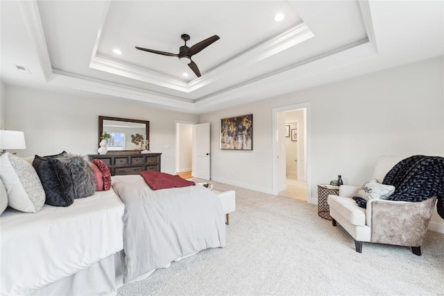 bedroom featuring recessed lighting, light colored carpet, baseboards, and a raised ceiling