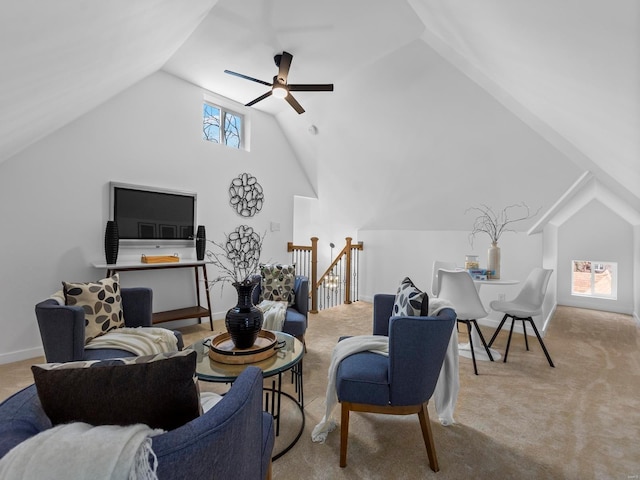 carpeted living room featuring lofted ceiling and ceiling fan