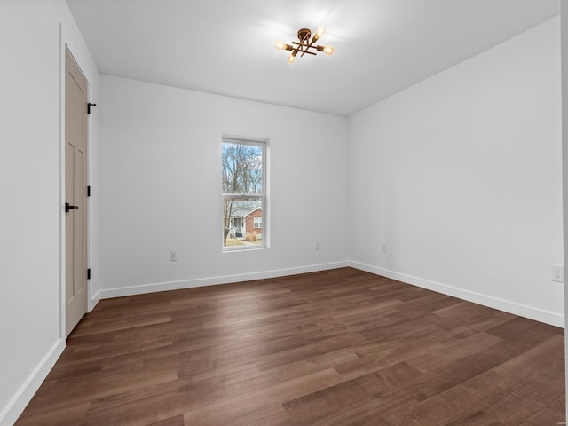 empty room featuring dark hardwood / wood-style floors