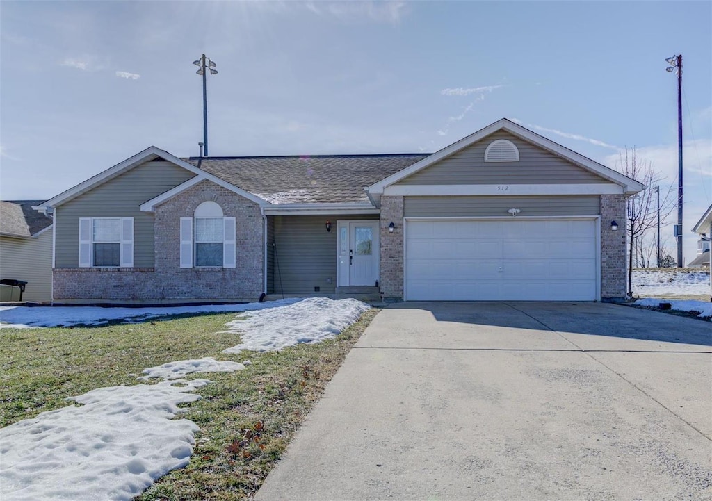 ranch-style home with a garage