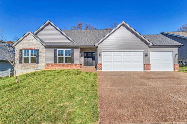 view of front of home with a garage and a front lawn